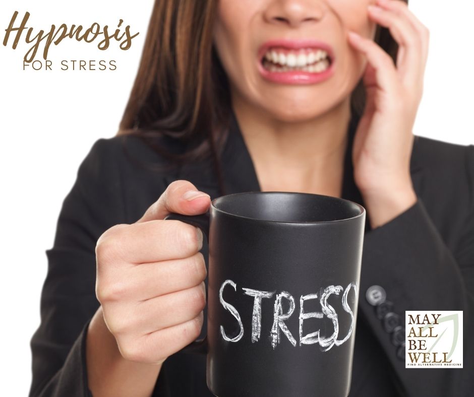 Woman holds a cup with the word 'stress' written on it while cringing.